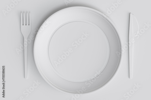Set of disposable utensils like plate, folk, spoon,knife and cup on monochrome