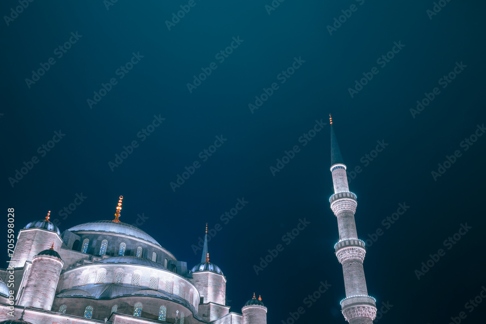 Fototapeta premium Blue Mosque or Sultanahmet Camii at night with copy space for text