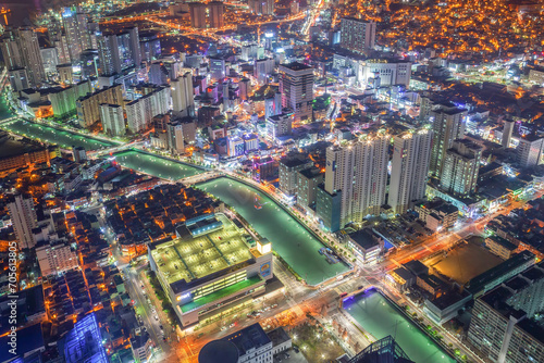 night scape of the city. Colorful buildings  roads  and city night view from the bifc observatory in Busan  Korea.