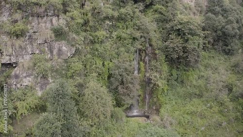 Beauty of Uttarakhand as a breathtaking waterfall cascades down the mountains.High quality footage photo