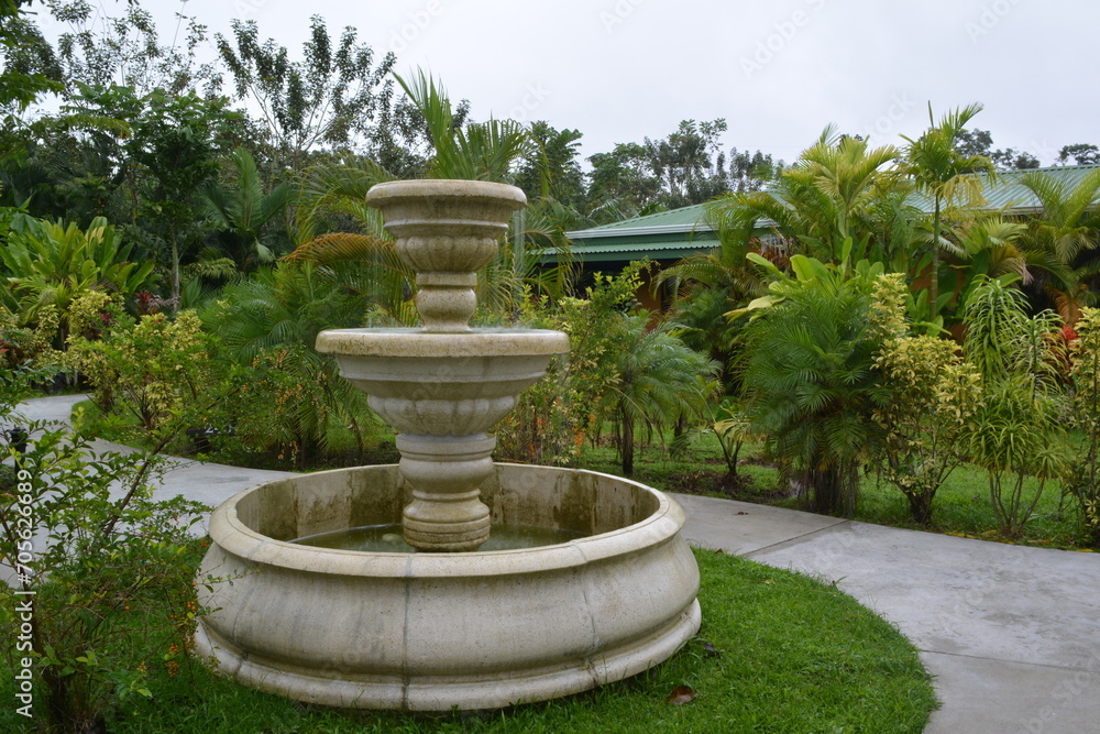 Romantic path and fountain in a tropical park in Costa Rica