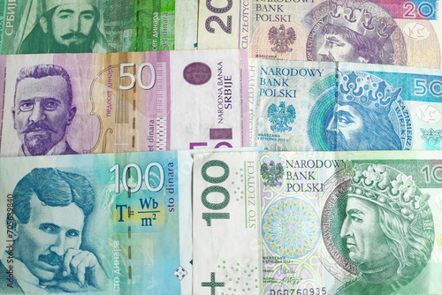 Stack of Serbian Dinar and Polish Zloty photo