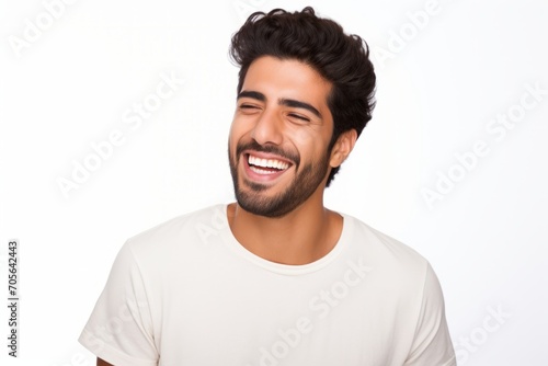 Studio Photo of Joyful Handsome Young Man Laughing. Photo Concept for Cosmetic or Dental Ads.