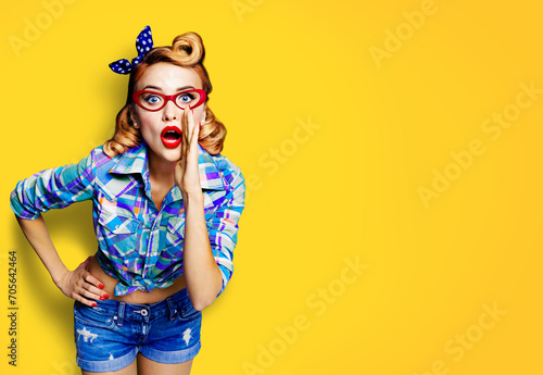 Portrait photo - beautiful woman in red eye glasses spectacles, hold hand near wide open mouth say wow. Pin up girl. Pinup model retro vintage studio concept, isolated yellow background. Ophthalmology