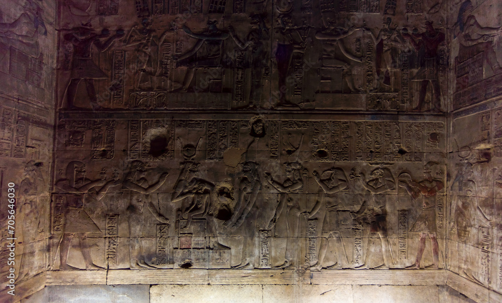 hieroglyphs on the wall of an ancient building in Egypt hieroglyphs on the wall of an ancient building in Egypt