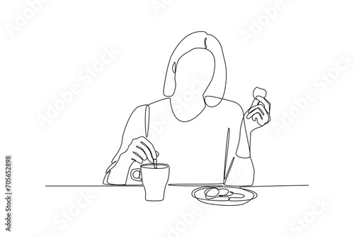 Woman breakfast with bread and tea. Meal minimalist concept