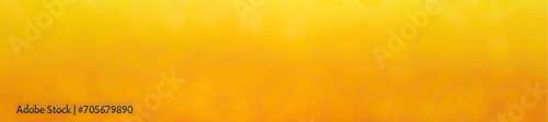 Abstract bokeh banner background in yellow orange. Autumn color. Beautiful background concept banner for Christmas or summer vacation