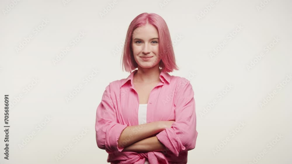 Confident Woman with Pink Hair on White Background Confident Woman with Pink Hair on White Background