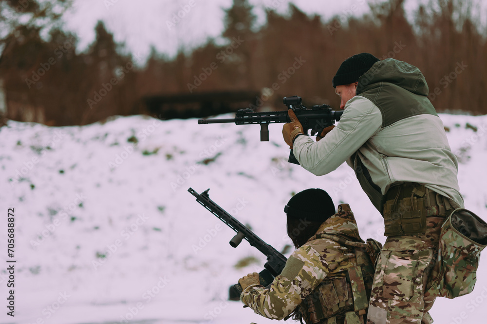 Fototapeta premium Military training. People training in tactical shooting.