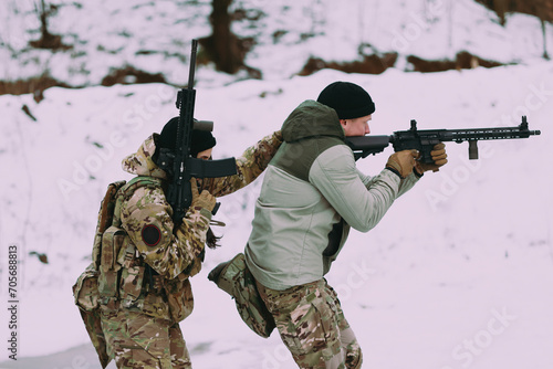 Military training. People training in tactical shooting. photo