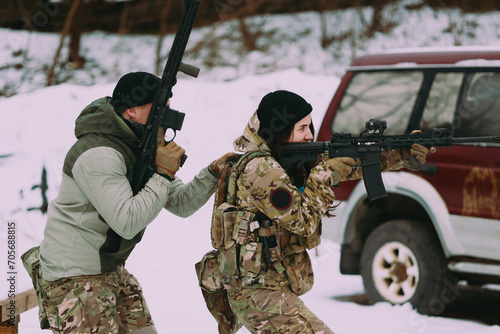 Military training. People training in tactical shooting. photo