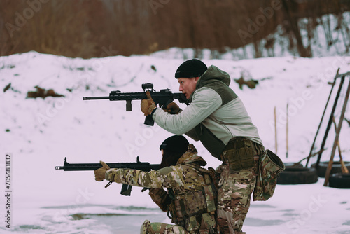 Military training. People training in tactical shooting.