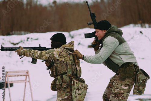 Military training. People training in tactical shooting.