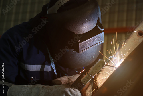 Steel welder builds technical, industrial steel welder in technical factory