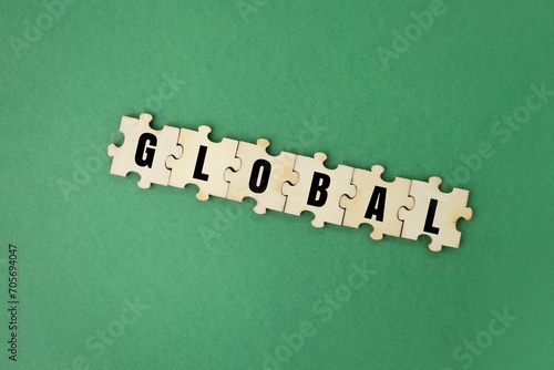Принти на полотні wooden puzzle with the word global
