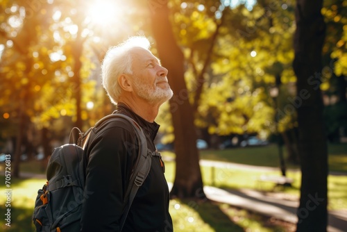 An elderly man in sportswear enjoying nature in a city park. AI generative