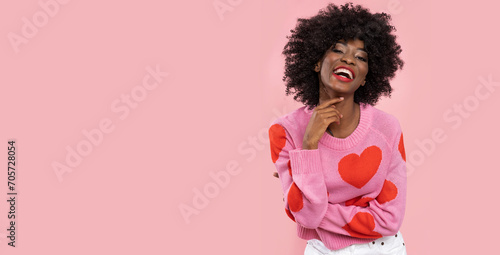 Happy afro american woman with balloon heart.