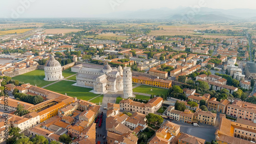 Pisa, Italy. Famous Leaning Tower and Pisa Cathedral in Piazza dei Miracoli. Summer. Morning hours, Aerial View photo