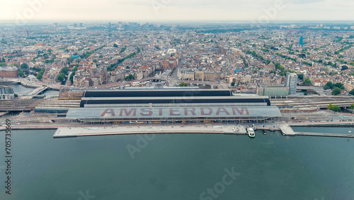 Amsterdam, Netherlands. Amsterdam Central Station. Amsterdam Centraal - The largest train station in the city, built in 1889. Bay IJ (Amsterdam), Aerial View