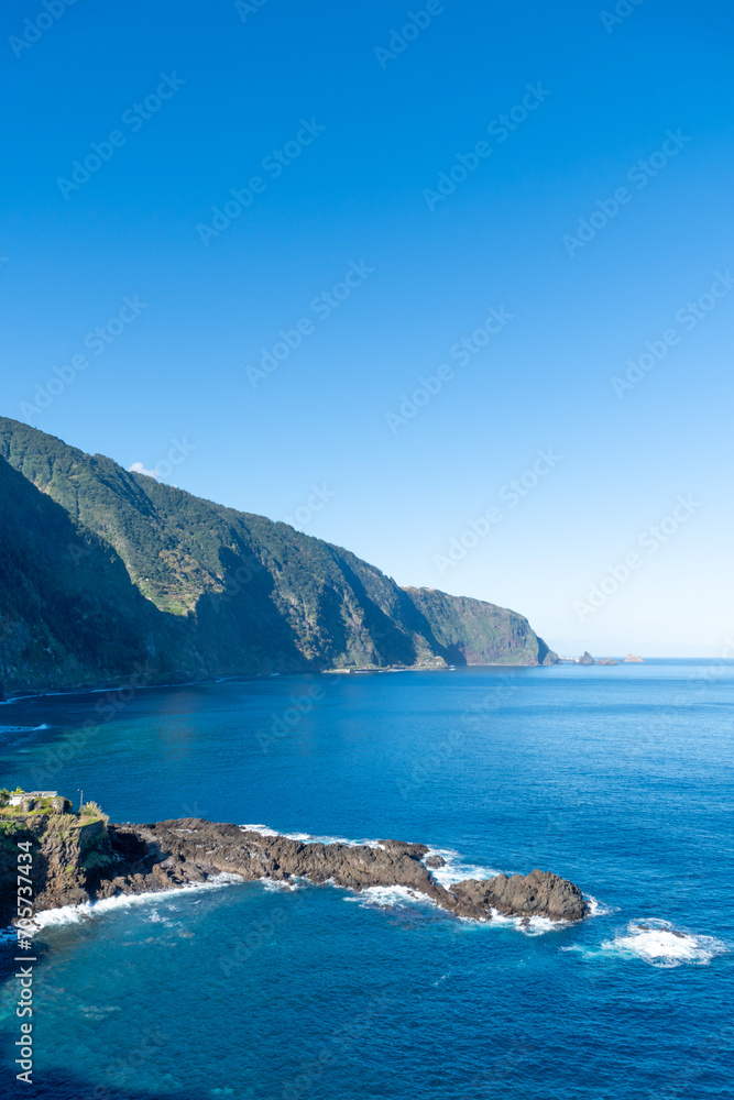 Waves crashing at the harsh coast line of Madeira Waves crashing at the harsh coast line of Madeira
