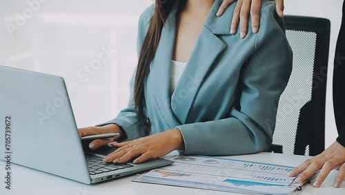 Beautiful young woman being victim of sexual harassment at workplace, copy space. Male boss touching his female secretary without permission at office. Corporate discrimination concept photo