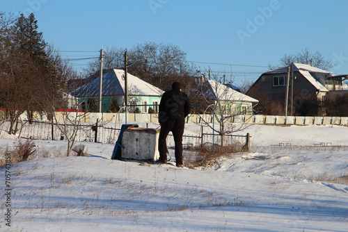 A person standing in the snow