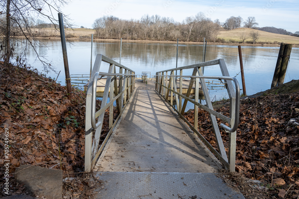 Fototapeta premium dock leading to a lake