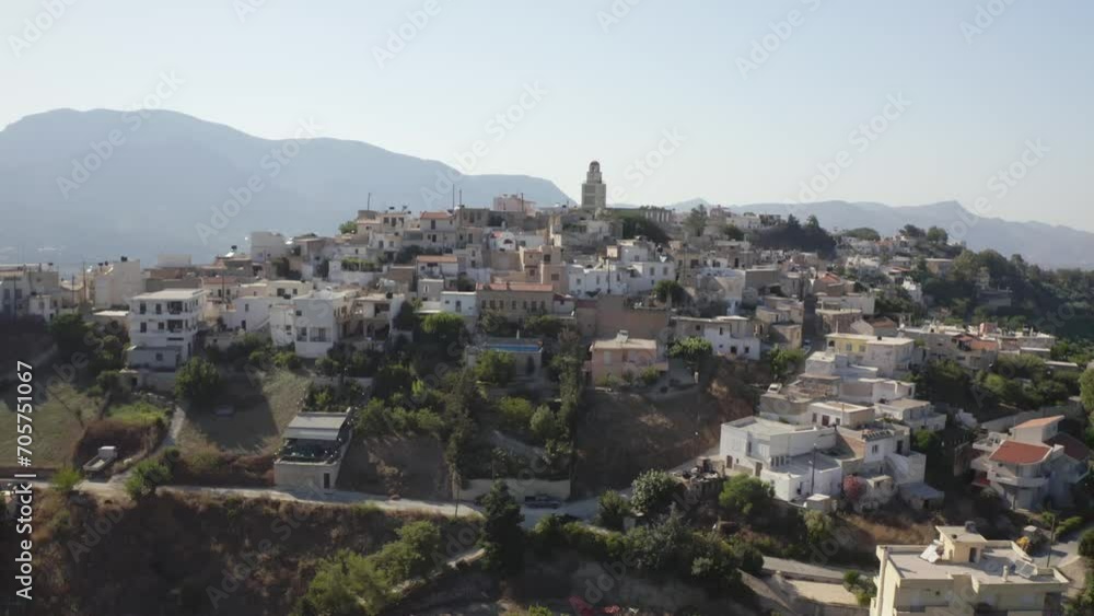 Drone shot of Agios Myronas Village on a sunny day in the Heraklion regional unit of Crete, Greece
