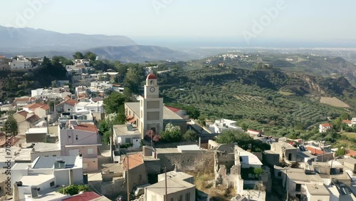 Drone footage of the Roloi place and surrounding buildings in Agios Myronas Village, Crete island photo