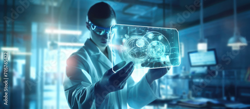 A woman in protective overalls white coat and virtual goggles holds up a holographic display in a blue-coloured laboratory