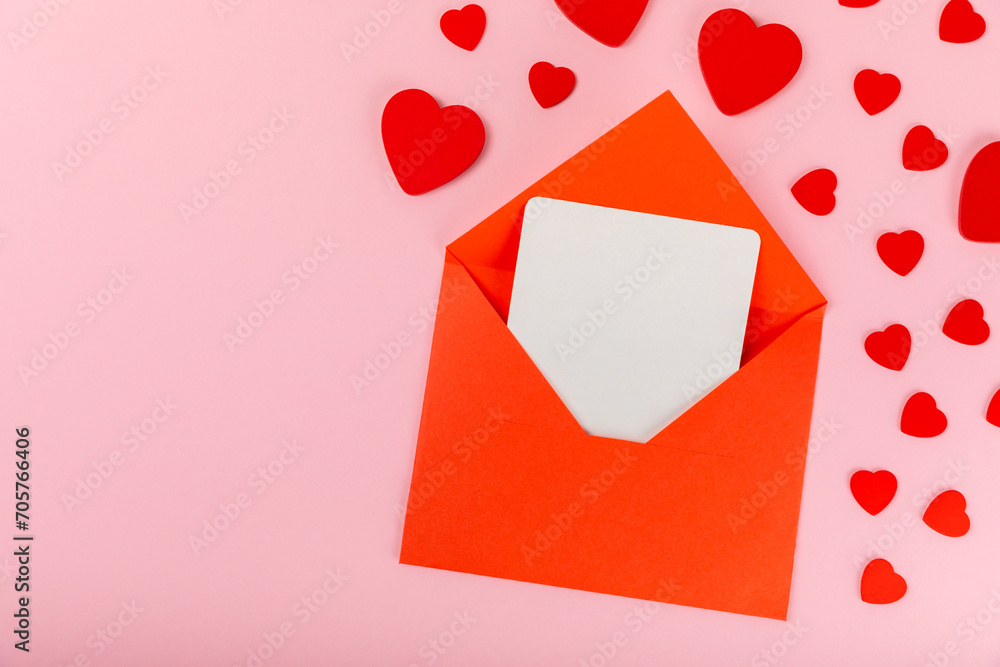 Valentine's Day concept. Valentine's Day background. Gifts, candles, confetti, envelope - postcard on a pink background. Flatley, top view, copy space.Valentine's day celebration Valentine's Day concept. Valentine's Day background. Gifts, candles, confetti, envelope - postcard on a pink background. Flatley, top view, copy space.Valentine's day celebration