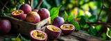 Fresh passion fruit with leaves in Wooden Box. Tropical Fruits. Free space for text.
