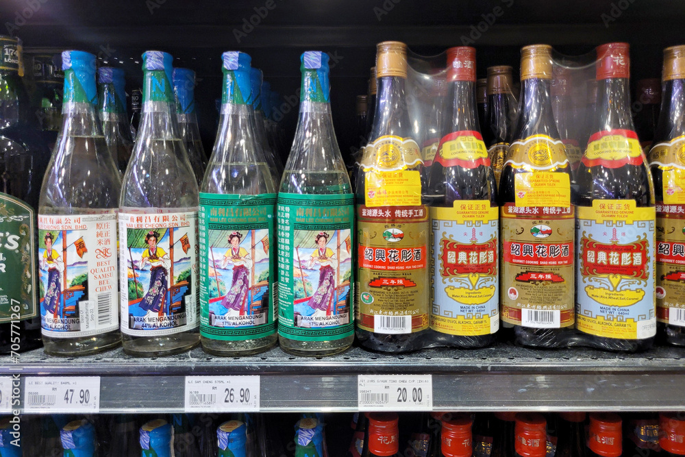 PENANG, MALAYSIA 1 DEC 2023 Chinese cooking rice wine display in Jaya grocery store. Rice
