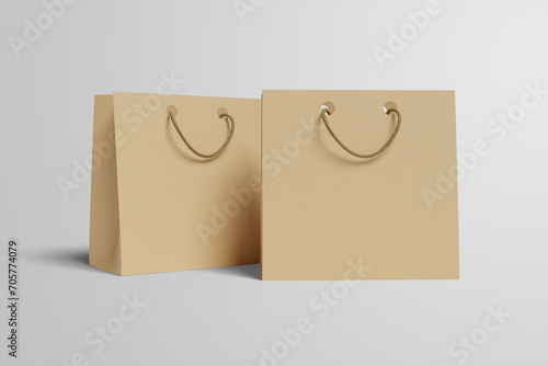 Two paper bag mockups for shopping located on a white plane