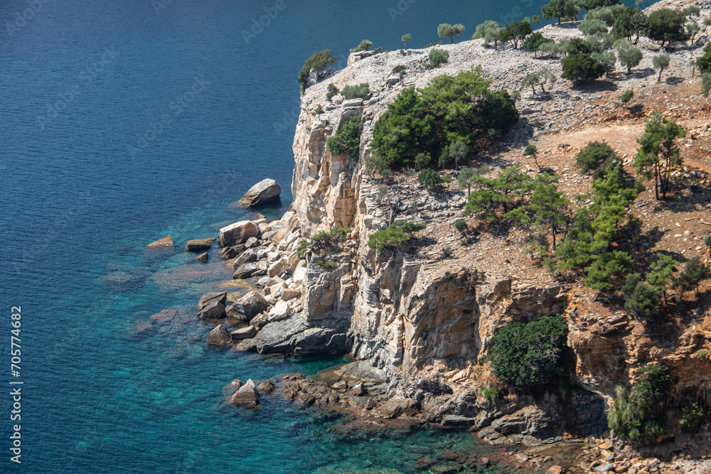 White cliff over the blue Sea with small vegetation on top, very attractive and picturesque scene