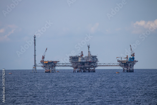 Oil refinery platform at the open sea, producing black gold, Aegean Sea, Greece  © Miros
