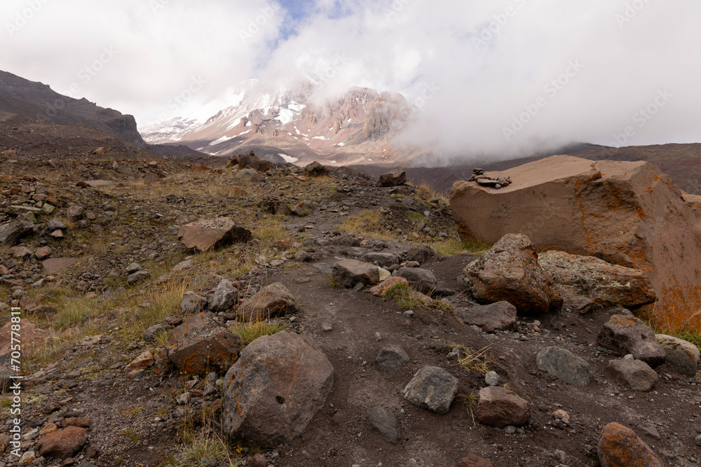 Mount Kazbegi in Georgia Caucasus mountains with snow and fog Mount Kazbegi in Georgia Caucasus mountains with snow and fog