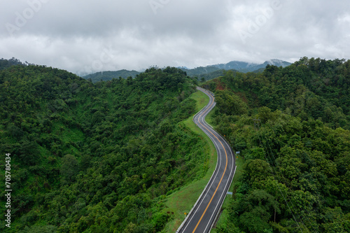 The road is similar to the number 3  This road is built on a mountain  past the forest in Nan Province of Thailand.