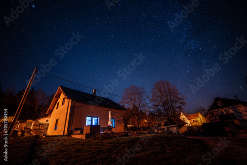 the milky way in the night with Haus 