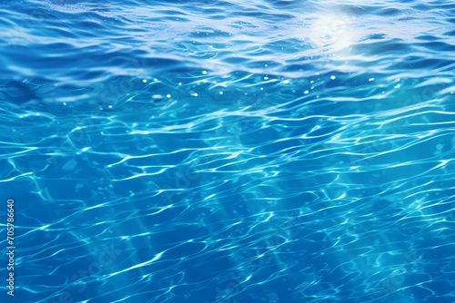 Close Up On A Picture Of A Blue Water Surface, Blue Water With Light Shining Through