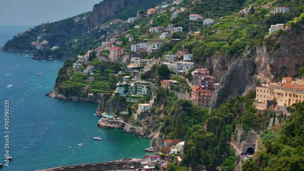 Amalfi coast view at sunrise, Italian seaside near Naples, towns of Amalfi and Atrani from above. Italian idyllic seaside resort, Amazing aerial footage of seaside old town. Amalfi coast view at sunrise, Italian seaside near Naples, towns of Amalfi and Atrani from above. Italian idyllic seaside resort, Amazing aerial footage of seaside old town.