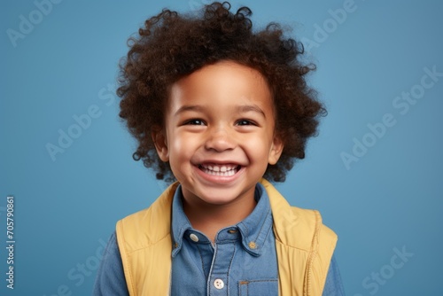 a professional portrait studio photo of a cute boy child model with perfect clean teeth laughing and smiling. isolated on white background. for ads and web design