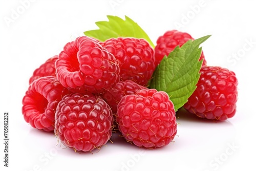  a pile of raspberries with leaves on a white background with a green leaf on top of the raspberries and the rest of the raspberries.