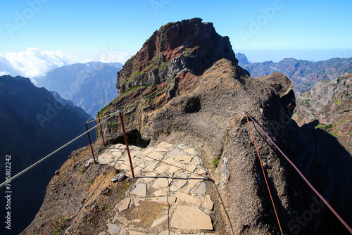 Walking trail at the Pico do Arieiro mountain peak on Madeira island  Portugal - Paved footpath for hikers visiting the third highest mountain of the island