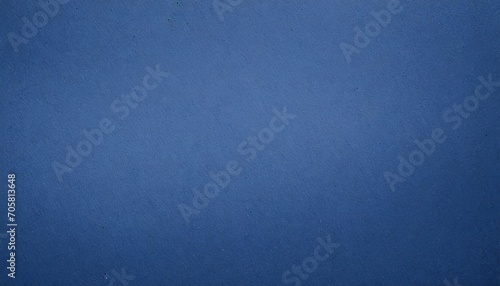 rough texture of classic solid navy blue tone color paint on environmental friendly cardboard box blank paper texture background with space and minimal design grunge style