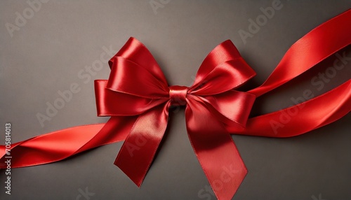 red silk ribbon and a big bow