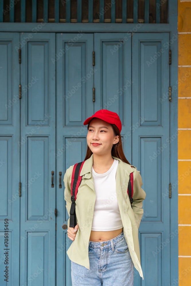 Portrait of an Asian woman backpacker traveler in Bangkok during a sunny day Portrait of an Asian woman backpacker traveler in Bangkok during a sunny day