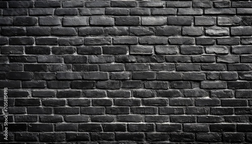 black brick wall as background or wallpaper or texture