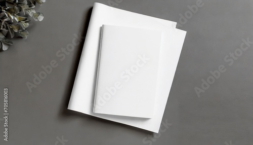blank magazine or brochure on white front cover top view as mockup template for your design presentation photo