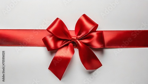 red ribbon with bow on white background